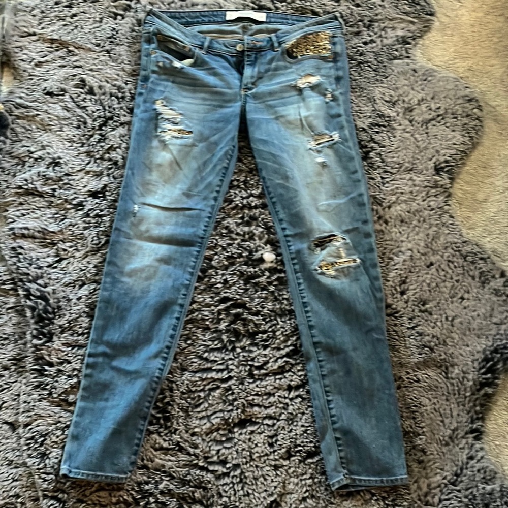 Abercrombie and Fitch distressed jeans.